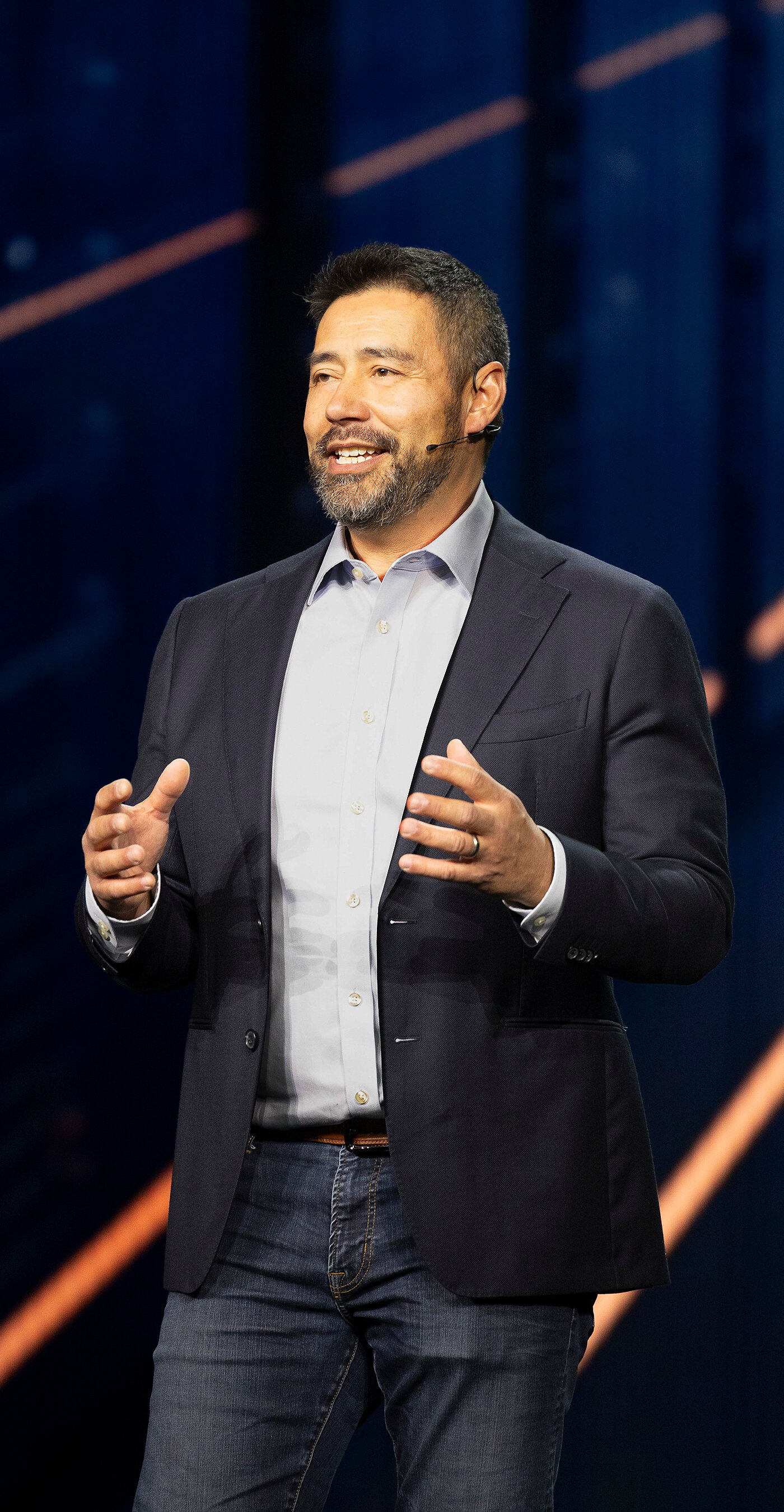 Joe Creed speaking with a headset microphone at CES 2026