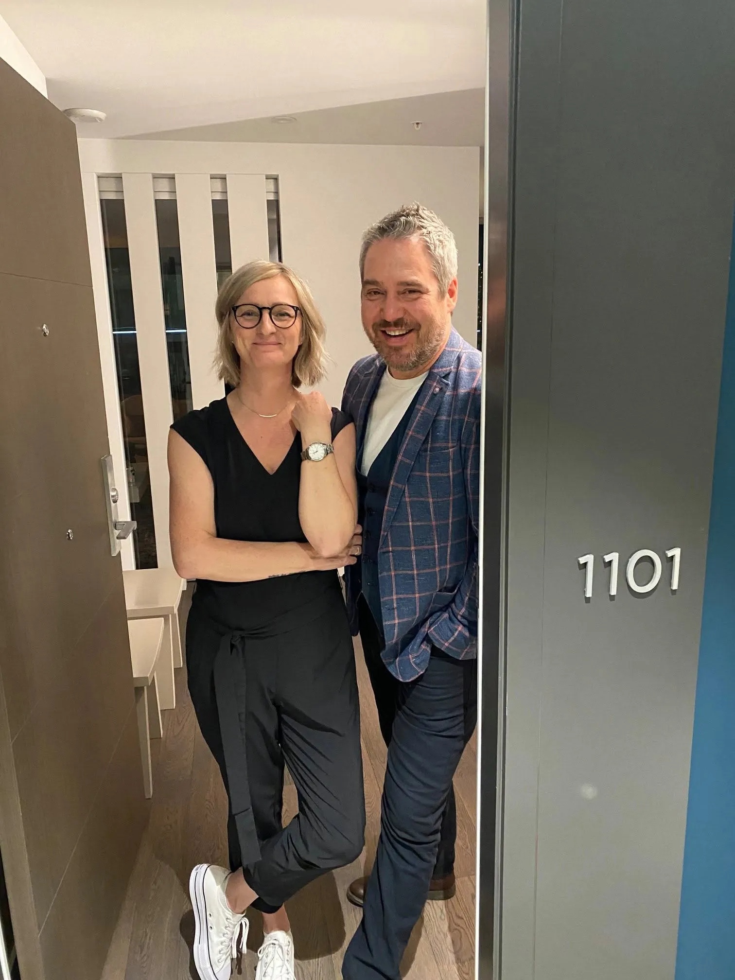 Dawn Thomas and Joe Girard standing together in a doorway