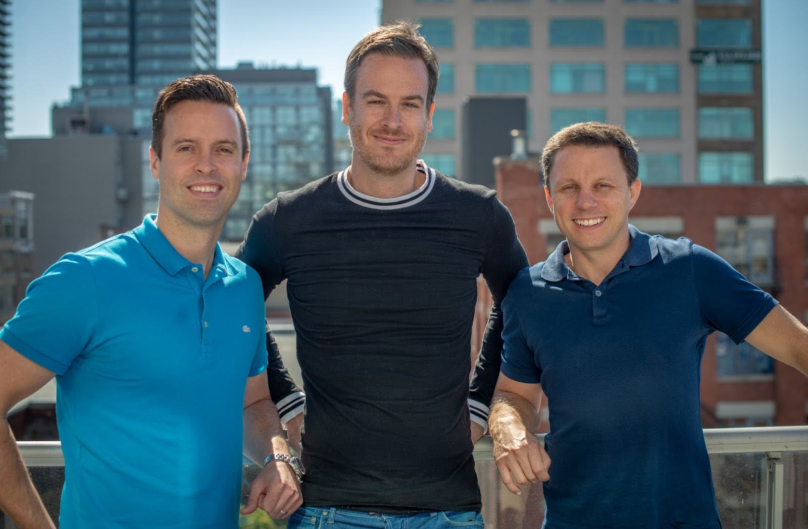 AgencyAnalytics founding partners Blake Acheson, Jesse Smith and Joe Kindness standing together outdoors