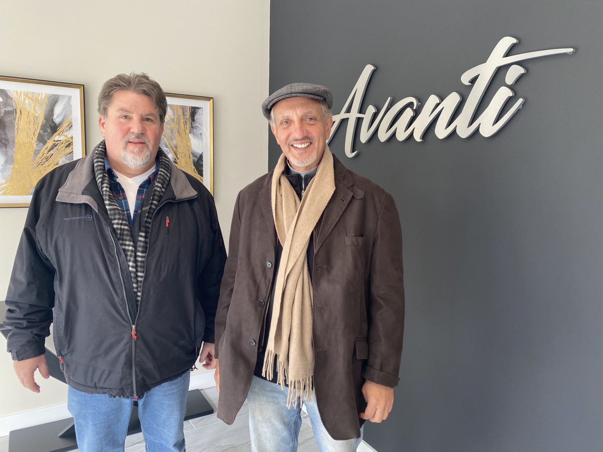 John Paoletti and Joe Salemme standing inside Avanti Apartments in Shelton, Connecticut