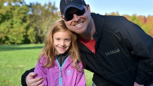 Joe Woyciechowski smiling outdoors at a Washington Township community event in 2016