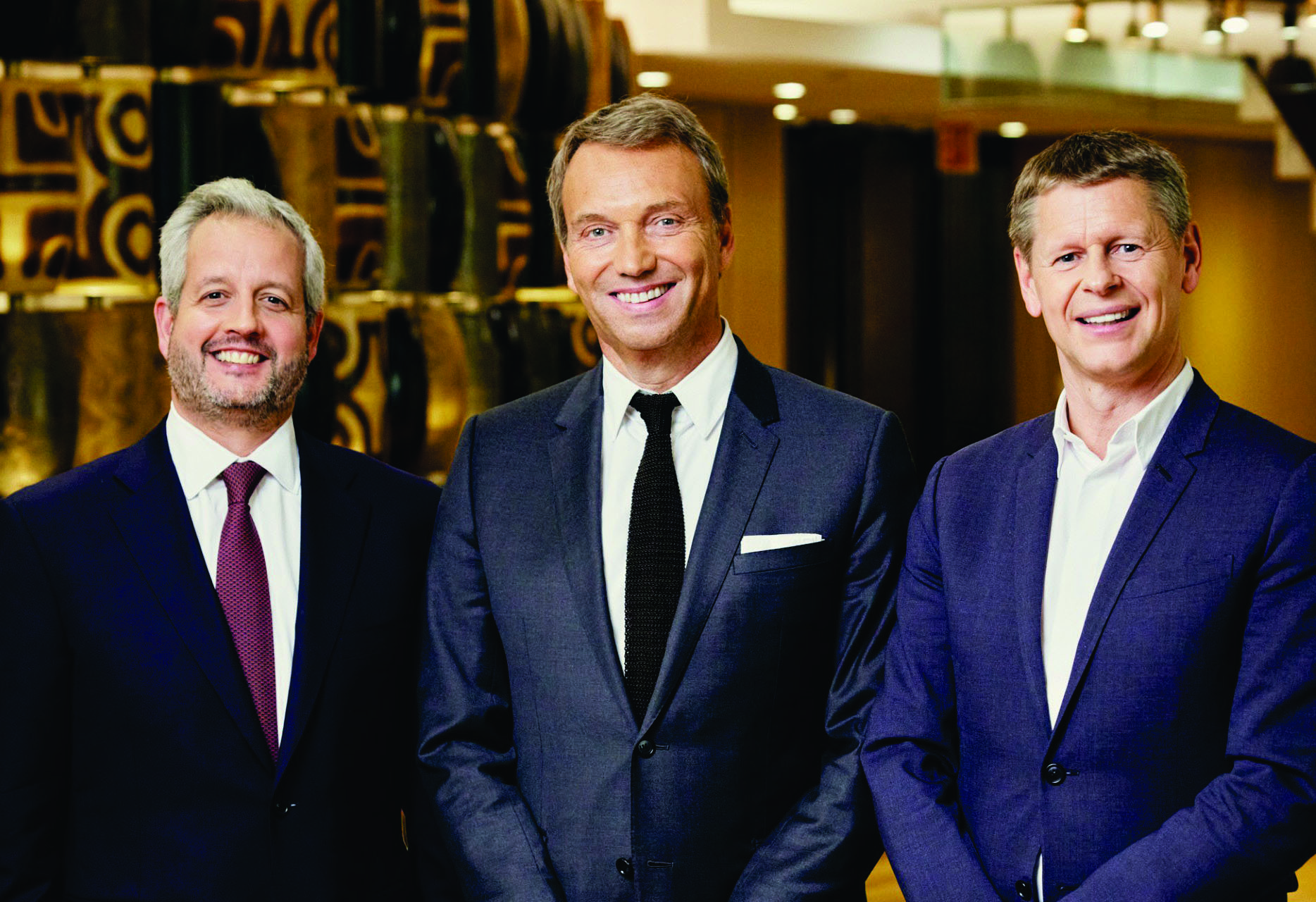 BGC co-chief executive officers John Abularrage, JP Aubin and Sean Windeatt standing together
