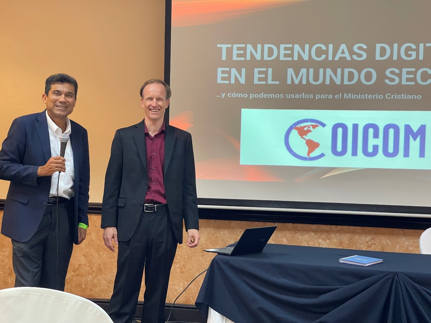 Arnold Enns, left, and John Carley, right, at COICOM 2023 in San Salvador