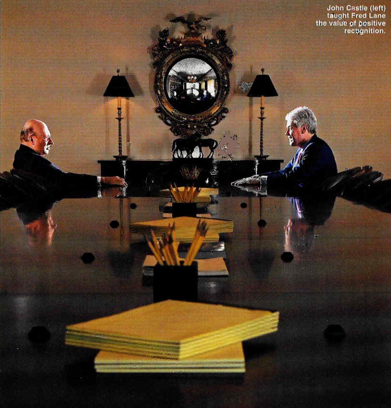 John Castle, left, seated across a conference table from Fred Lane