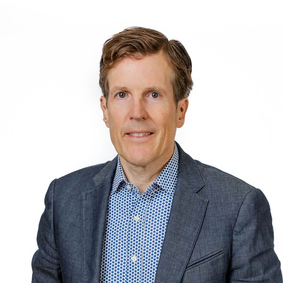 Portrait of John Eielson, co-CEO of FlatWorld