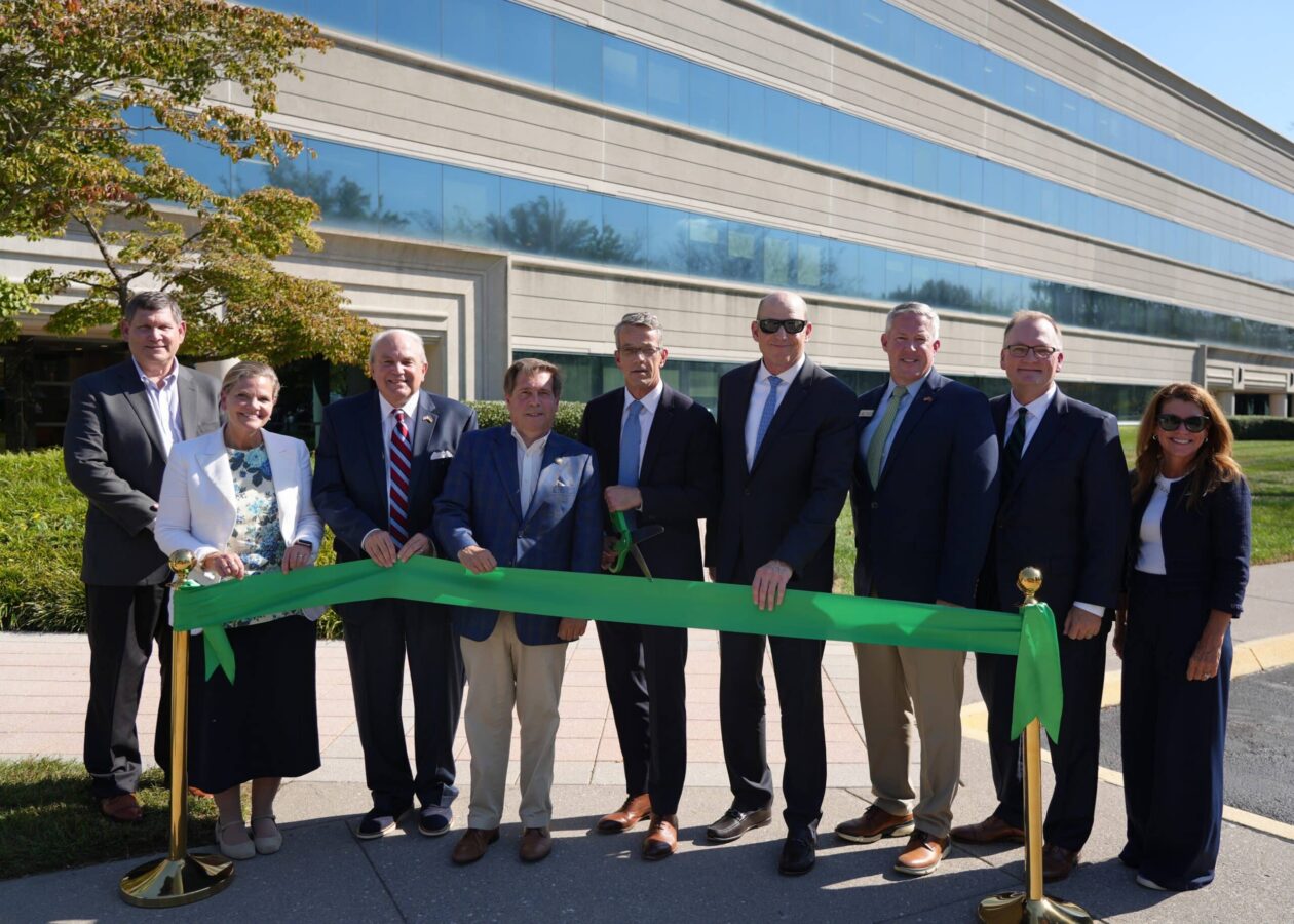 John Heller joins officials and colleagues at a green-ribbon ceremony outside Amentum’s Global Nuclear headquarters in Oak Ridge