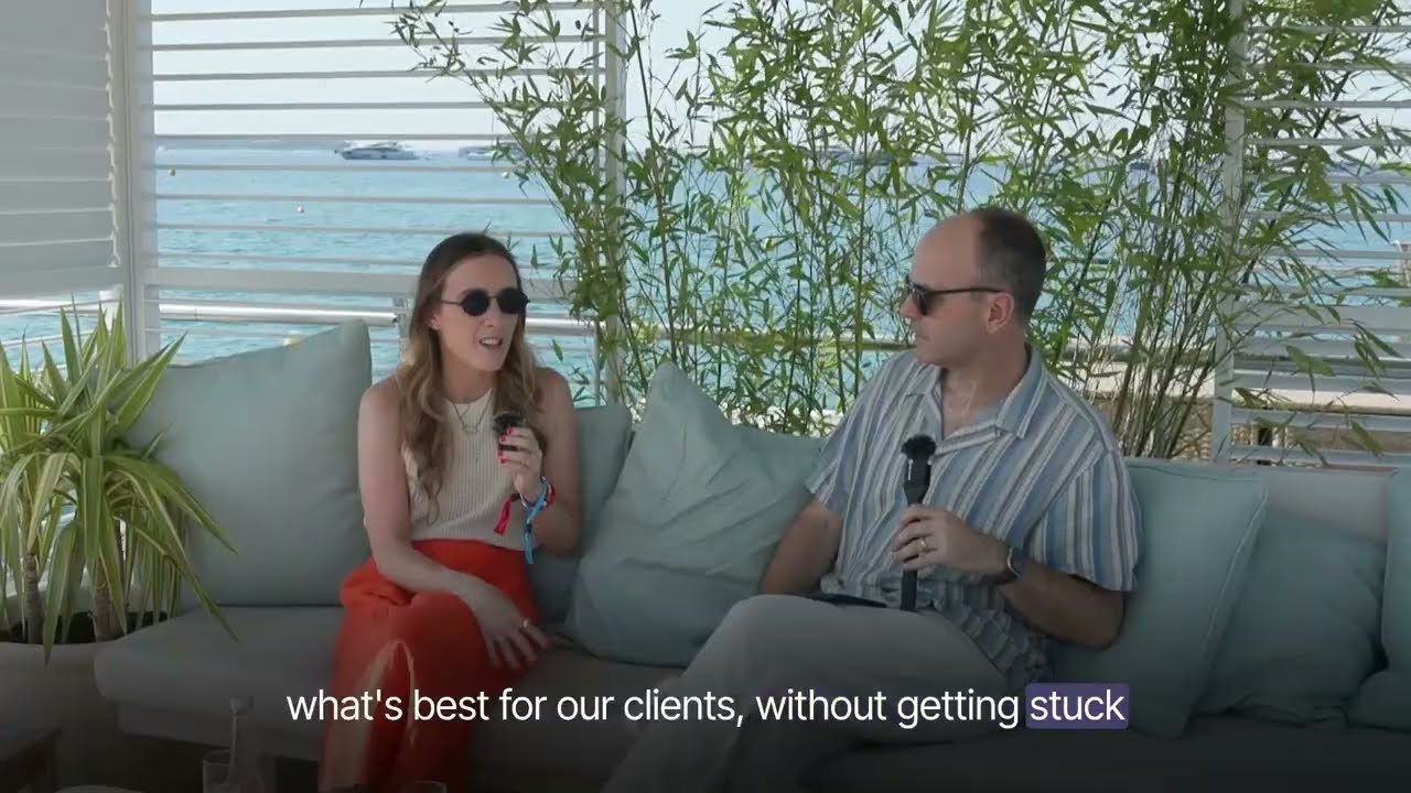 John Hoctor speaking with Emily Kennedy during a Newton Research and dentsu fireside chat at Cannes Lions 2026