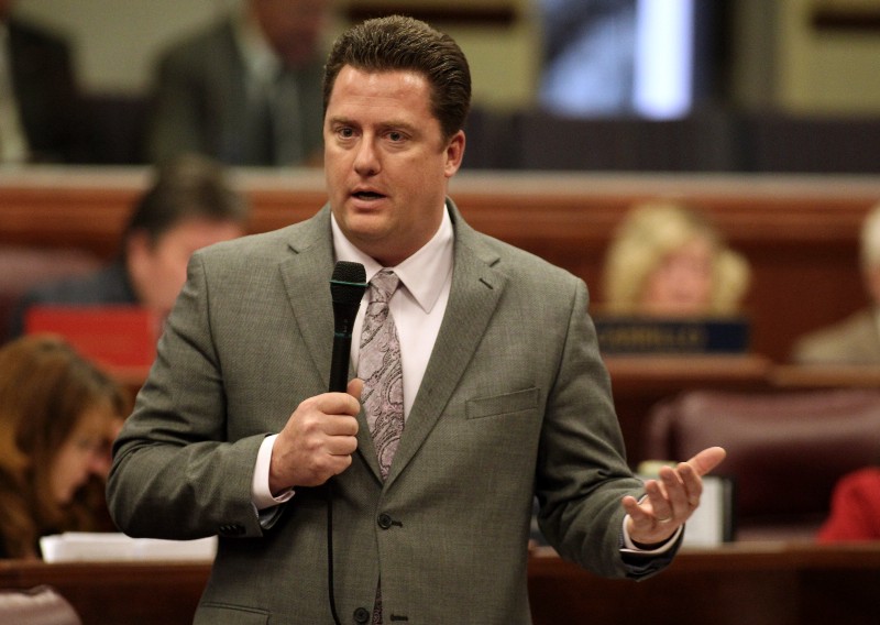 John Oceguera speaking with a handheld microphone on the Nevada Assembly floor