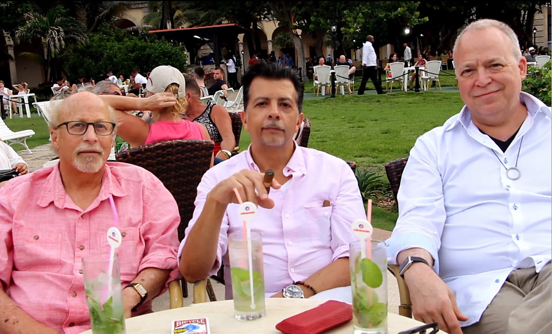 Bill Herz, John Rose and Jon Stetson sitting together outdoors, identified left to right.