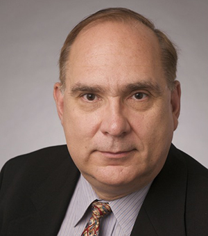 Portrait of John A. Serri, co-founder and CEO of EyeQue Corporation