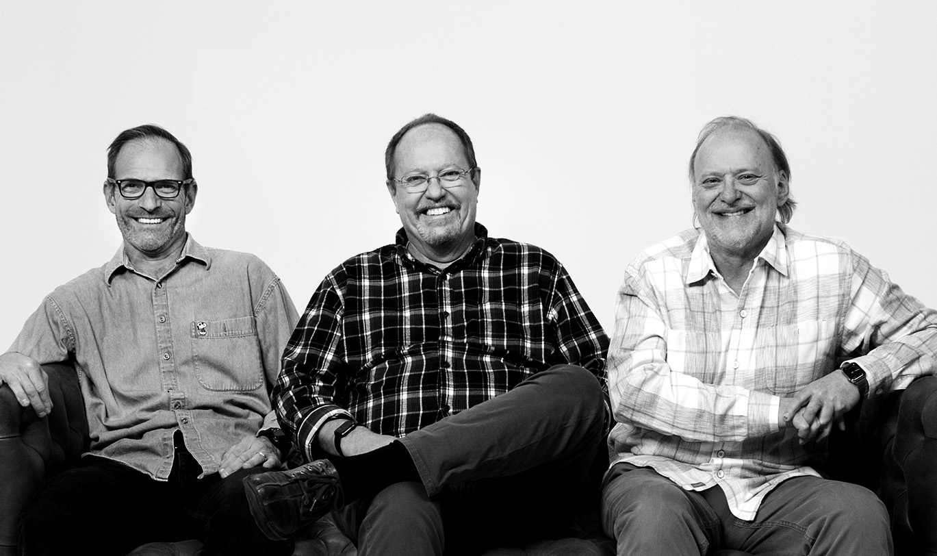 Pax8 co-founders Ryan Walsh, John Street and Klaus Dimmler seated together