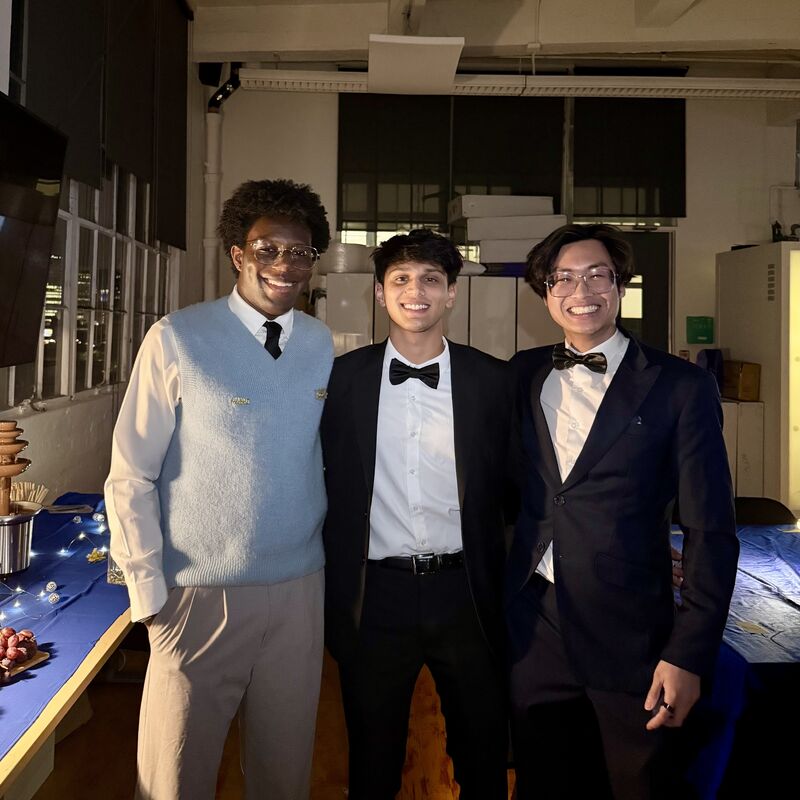 John Ta, at right, with the Affil.ai team at an event