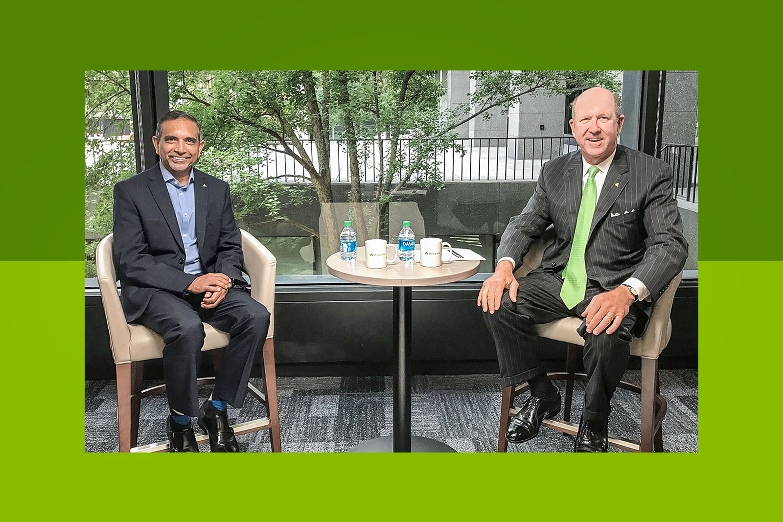 Manav Misra and John Turner in a seated discussion about data and analytics