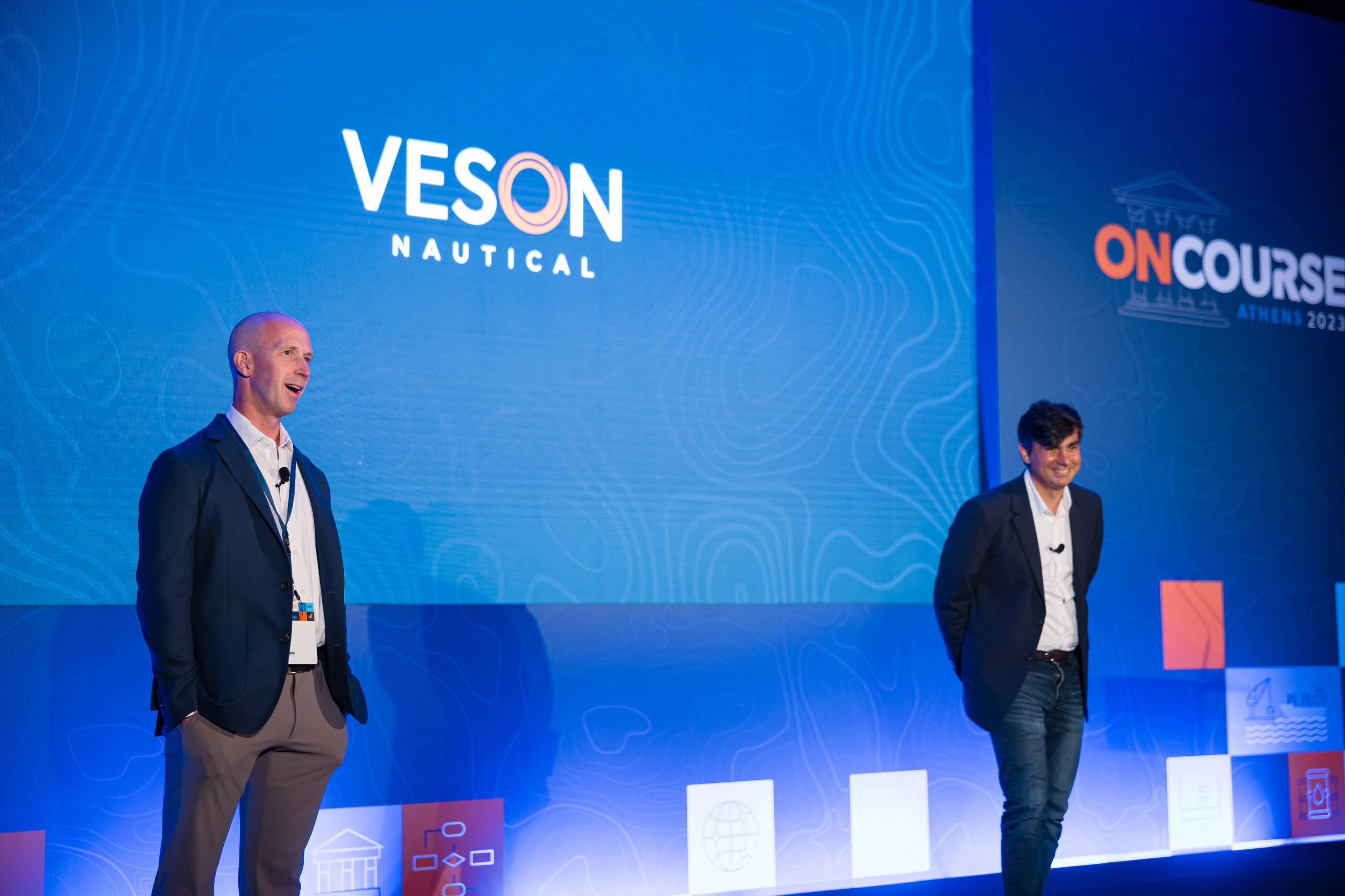 Sean Riley on the left and John Veson on the right at ONCOURSE2023 in Athens