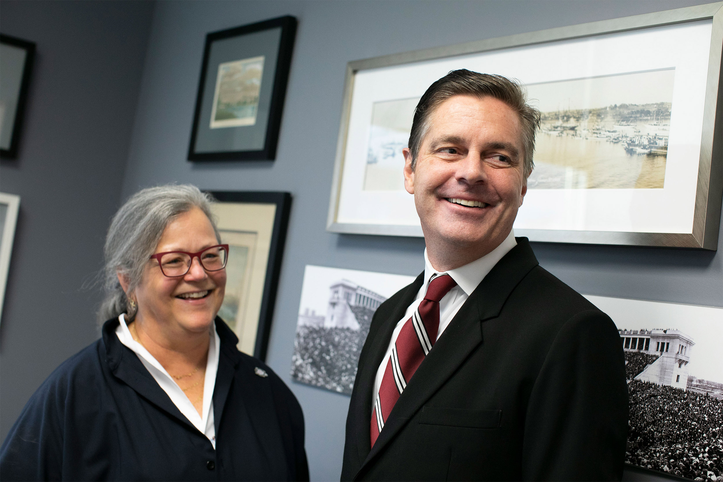 Alice Hill and John West smile together at Harvard in 2020