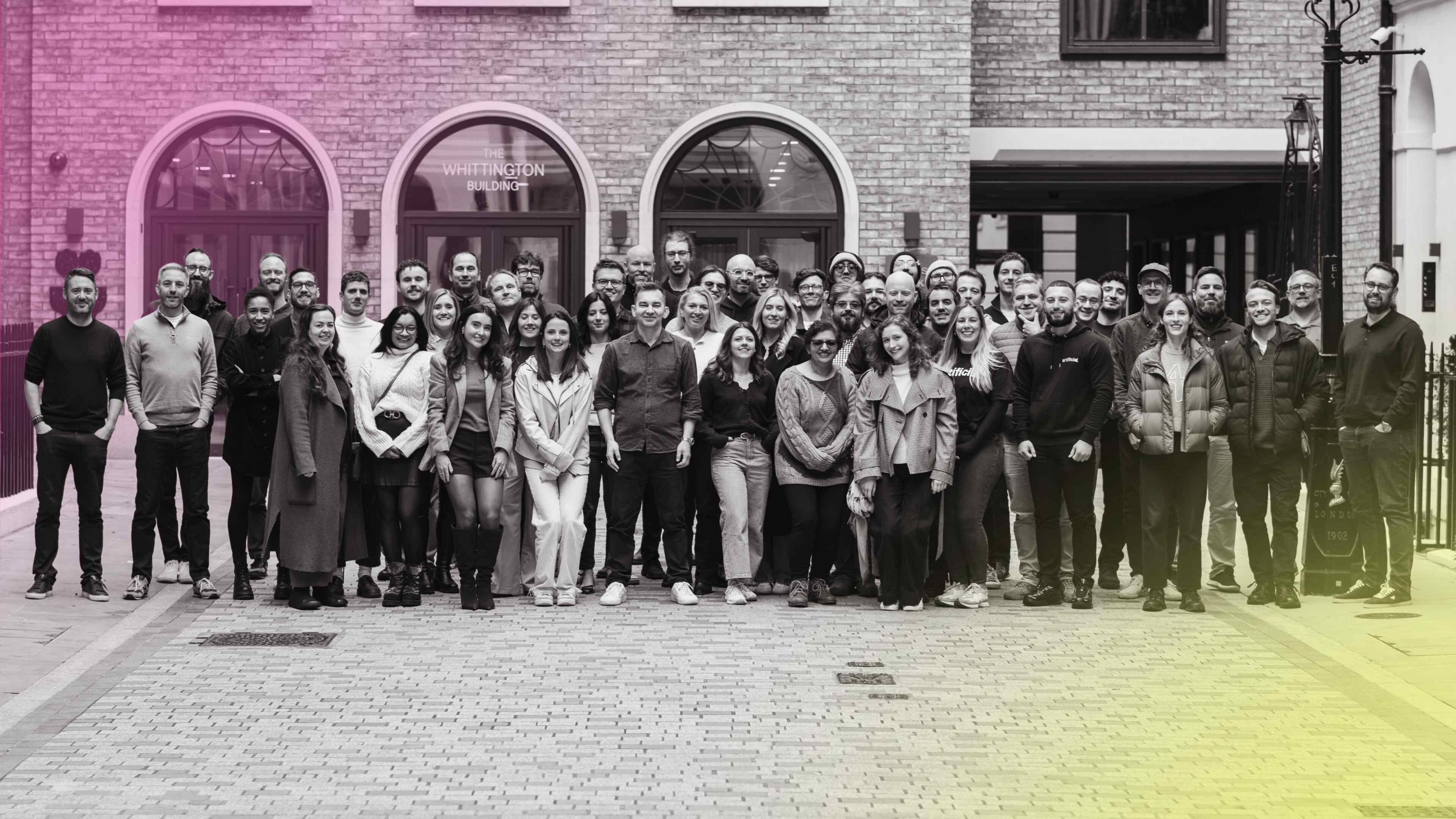 Artificial Labs team gathered outside the Whittington Building in London