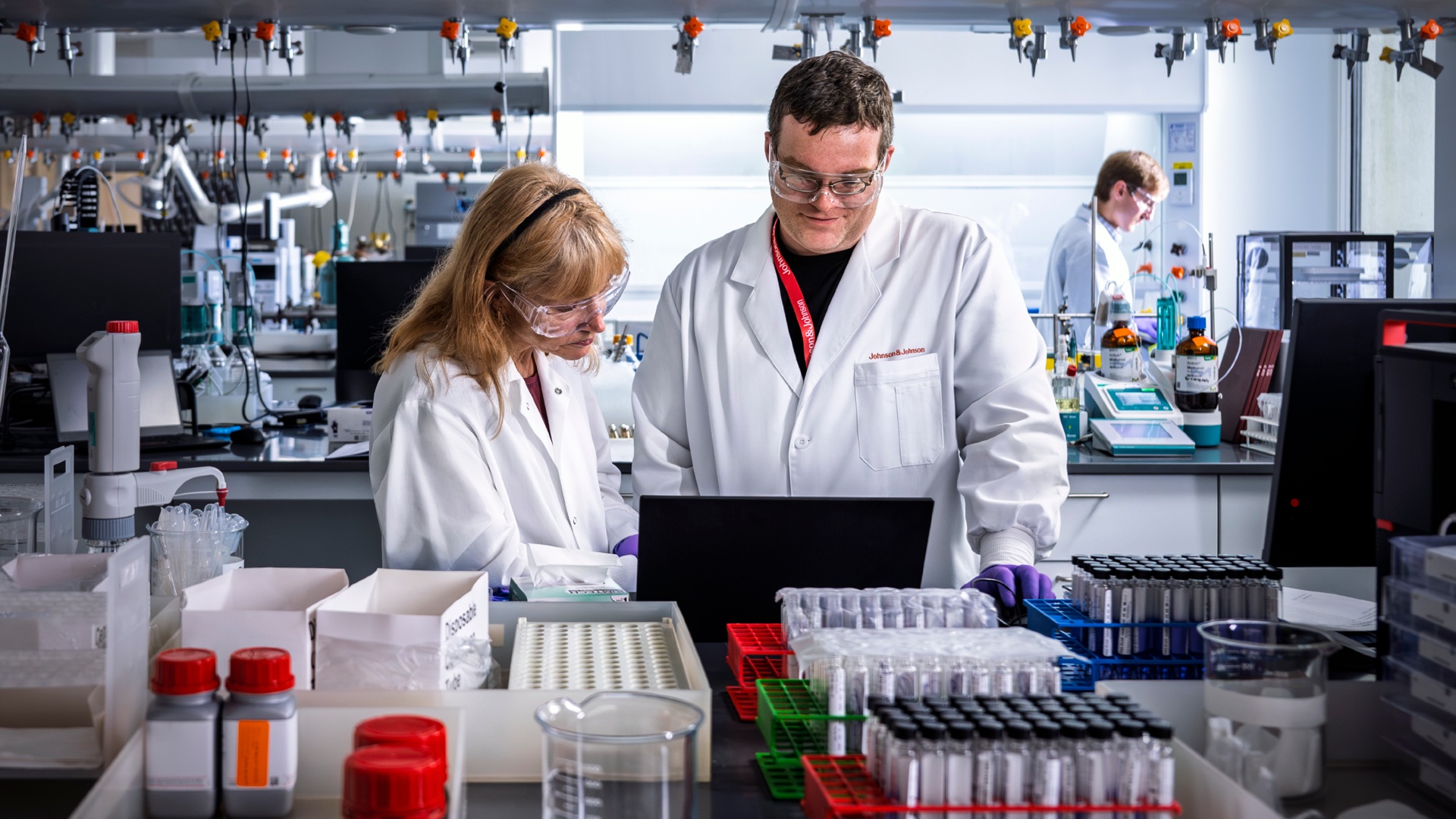 Johnson & Johnson researchers reviewing data together in a laboratory