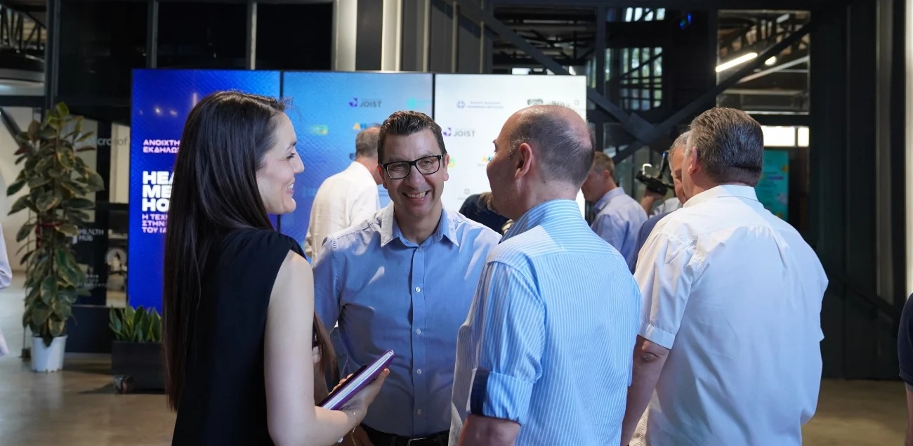 Participants talking at a JOIST networking event