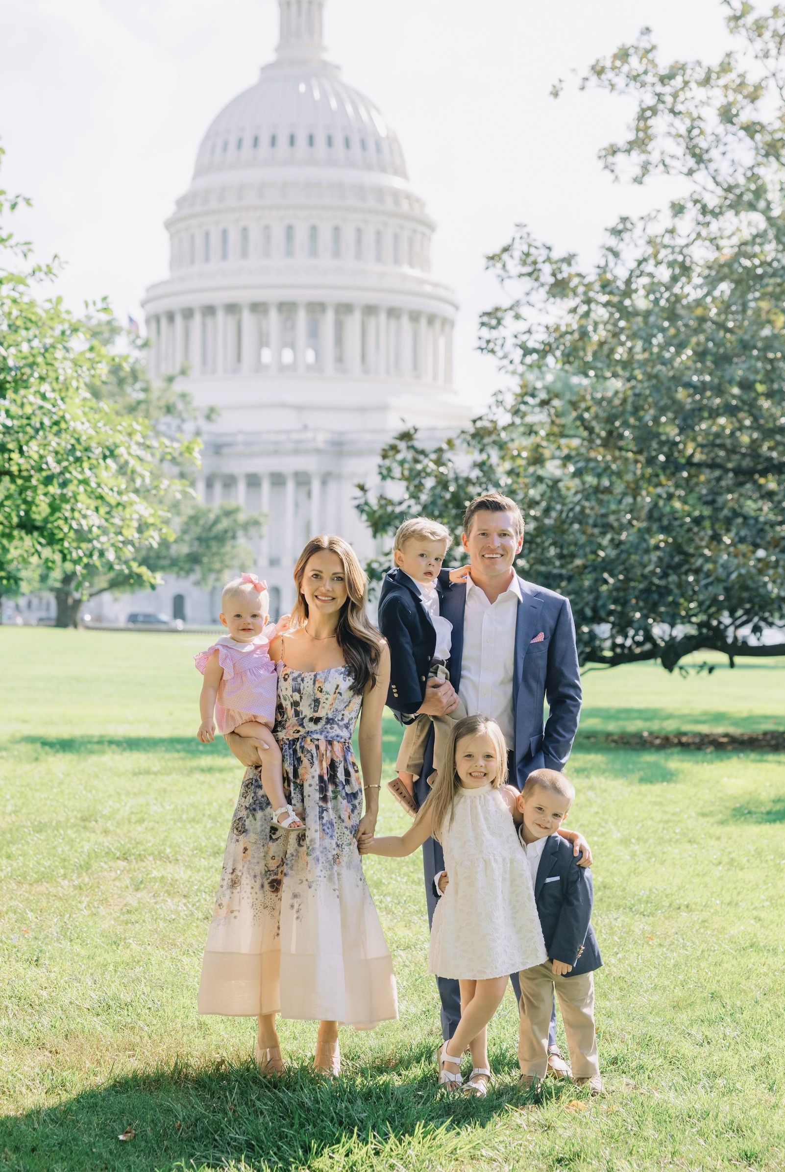 Michael McCollum Adams and Jon Adams with their four children in front of the United States Capitol
