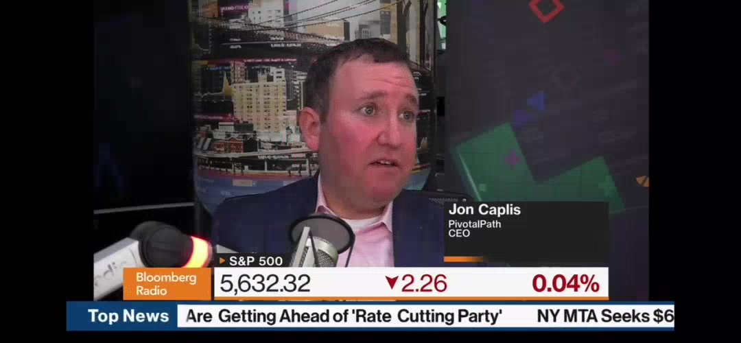 Jon Caplis speaking into a microphone during a Bloomberg Radio interview, with his name and PivotalPath CEO title shown on screen