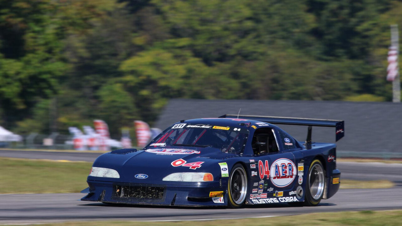 Jon DeGaynor’s blue number 04 Speed Dream’n Racing Ford Mustang on track