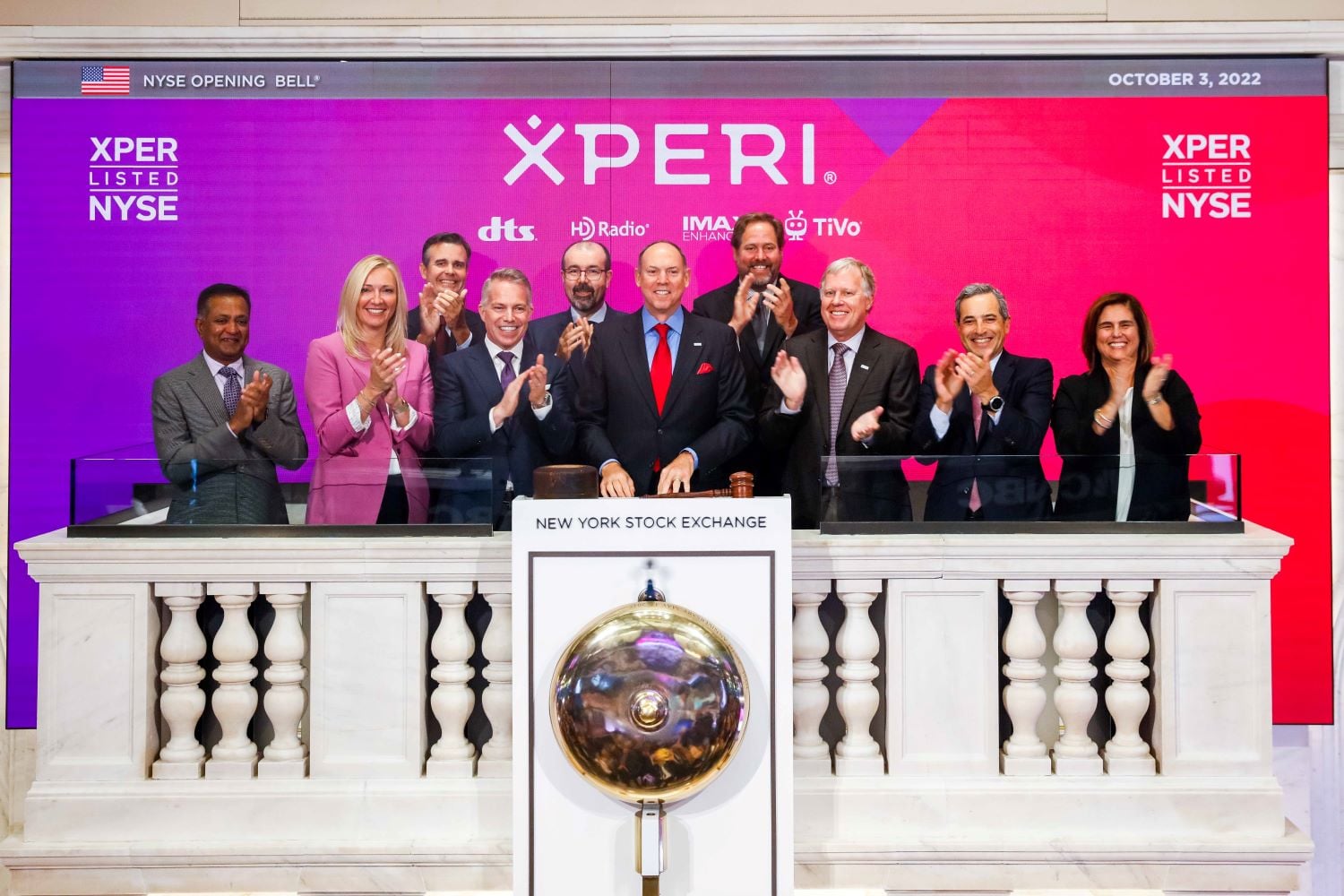Jon Kirchner at the center of Xperi’s executive team during the NYSE opening bell ceremony on October 3, 2022