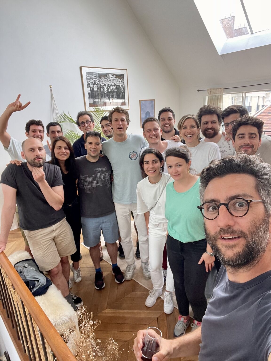 Jonathan Azoulay taking a group selfie with talent.io’s leaders at his home