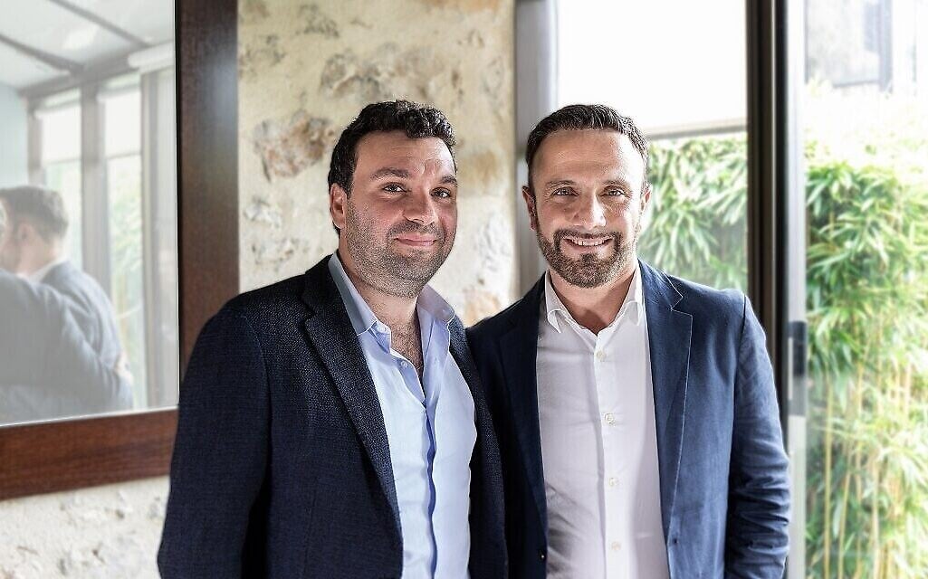 Jonathan Cherki, right, with Shlomi Hagai in a press photograph