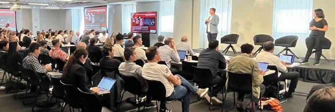 Jonathon Troughton and Cary Tilds speaking to an audience at the IAB Tech Lab Summit in New York