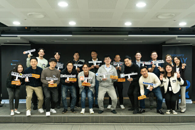 Founders and judges posing together at D.Camp's February 2024 D.Day event