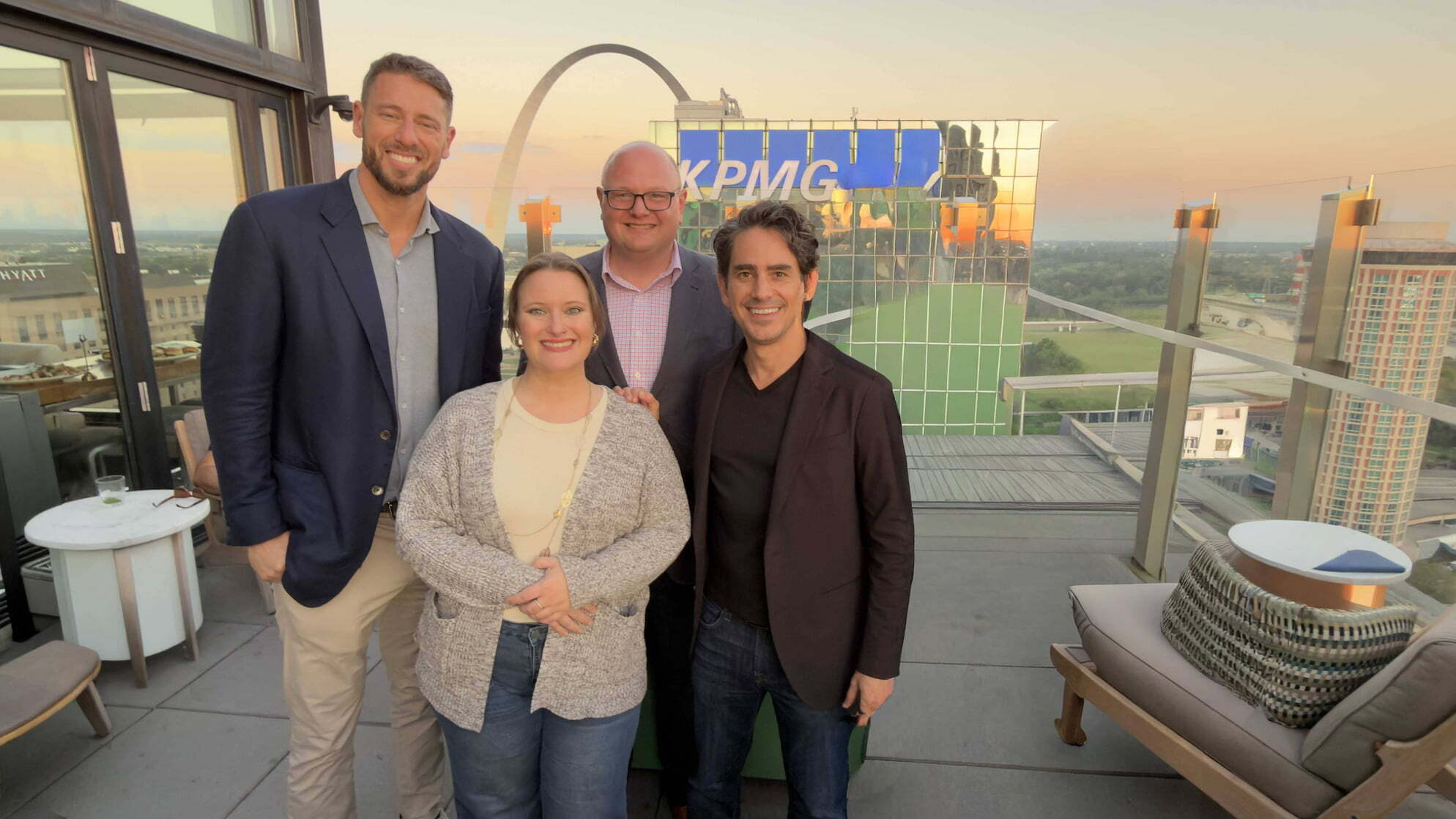 Jordan Fliegel with the Acquisition Lab leadership group, with the Gateway Arch behind them