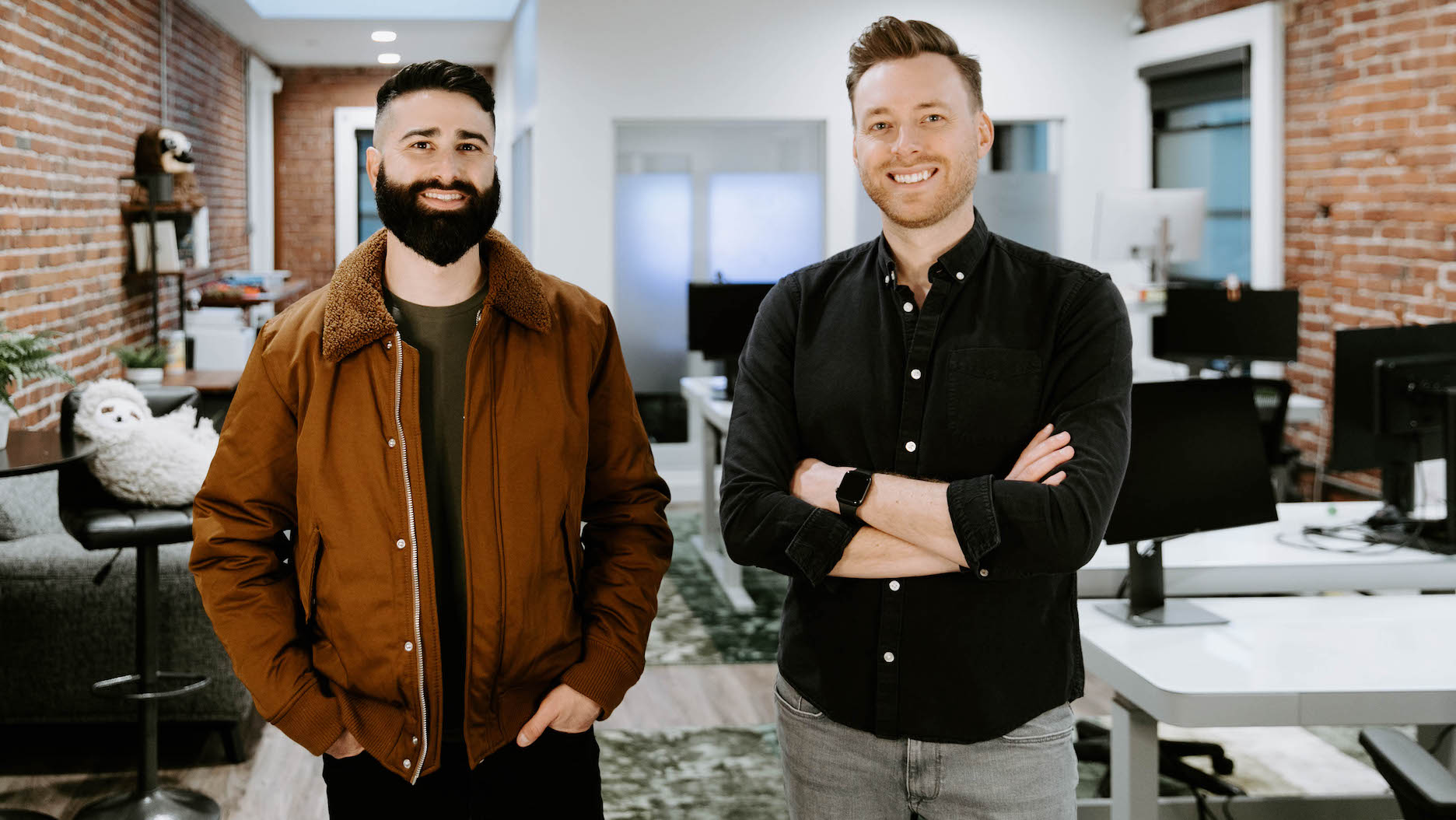 Jordan Nemrow, left, and Will Bewley standing in an office