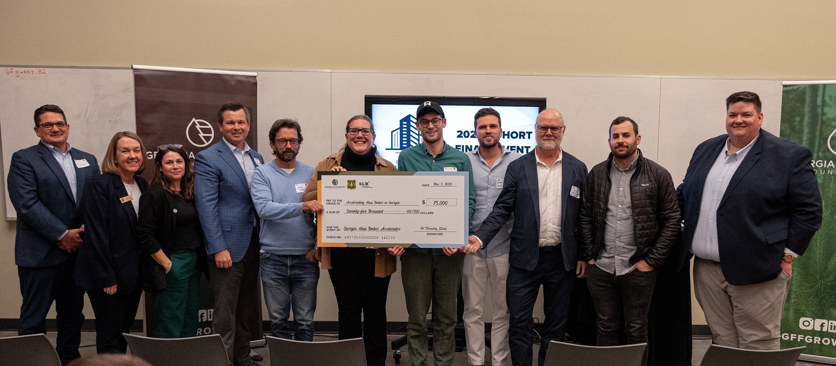 Josef Bromovsky, seventh from left, with Georgia Mass Timber Accelerator participants at their finale event