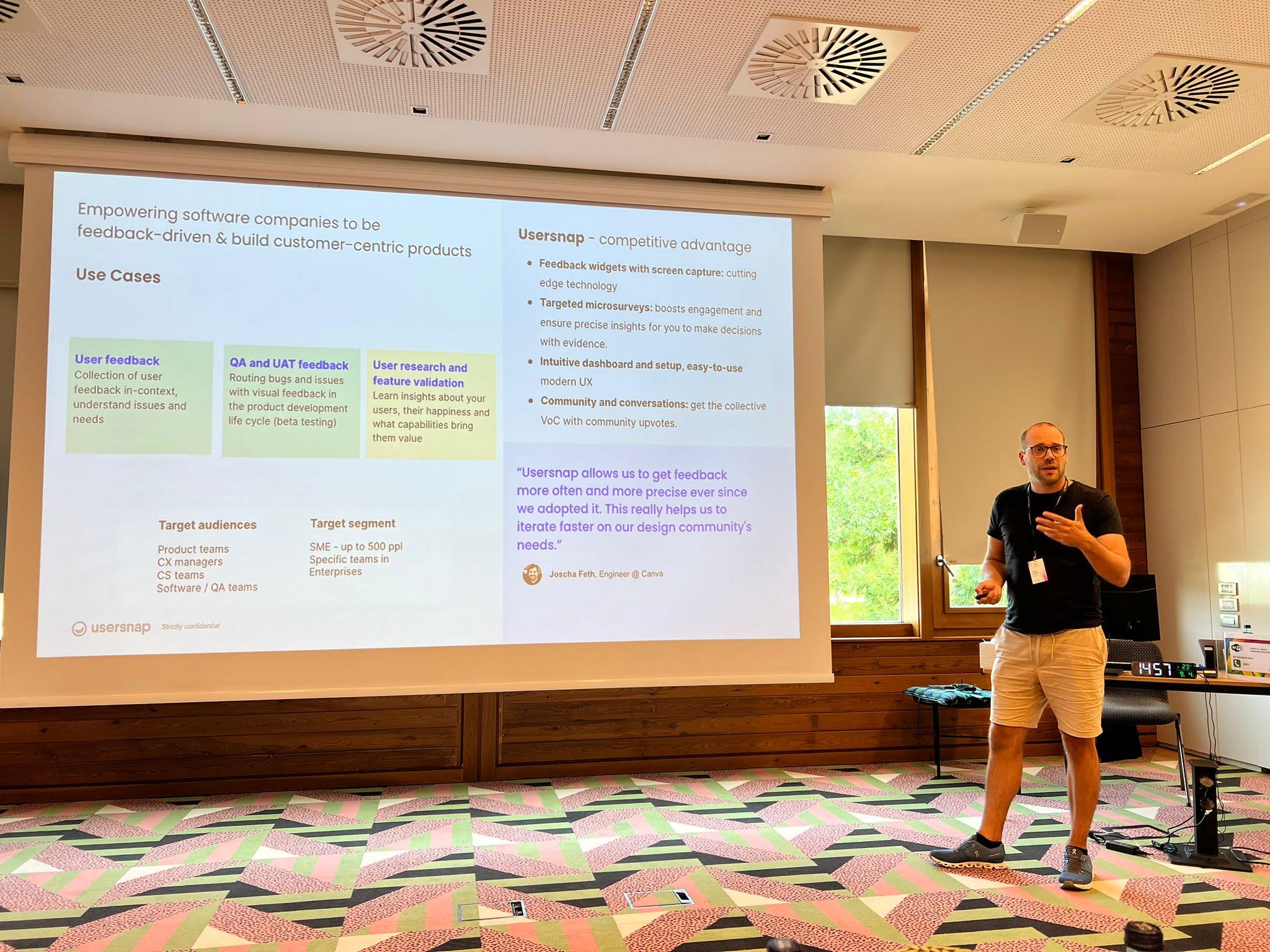 Josef Trauner presenting a Usersnap slide about feedback and product development