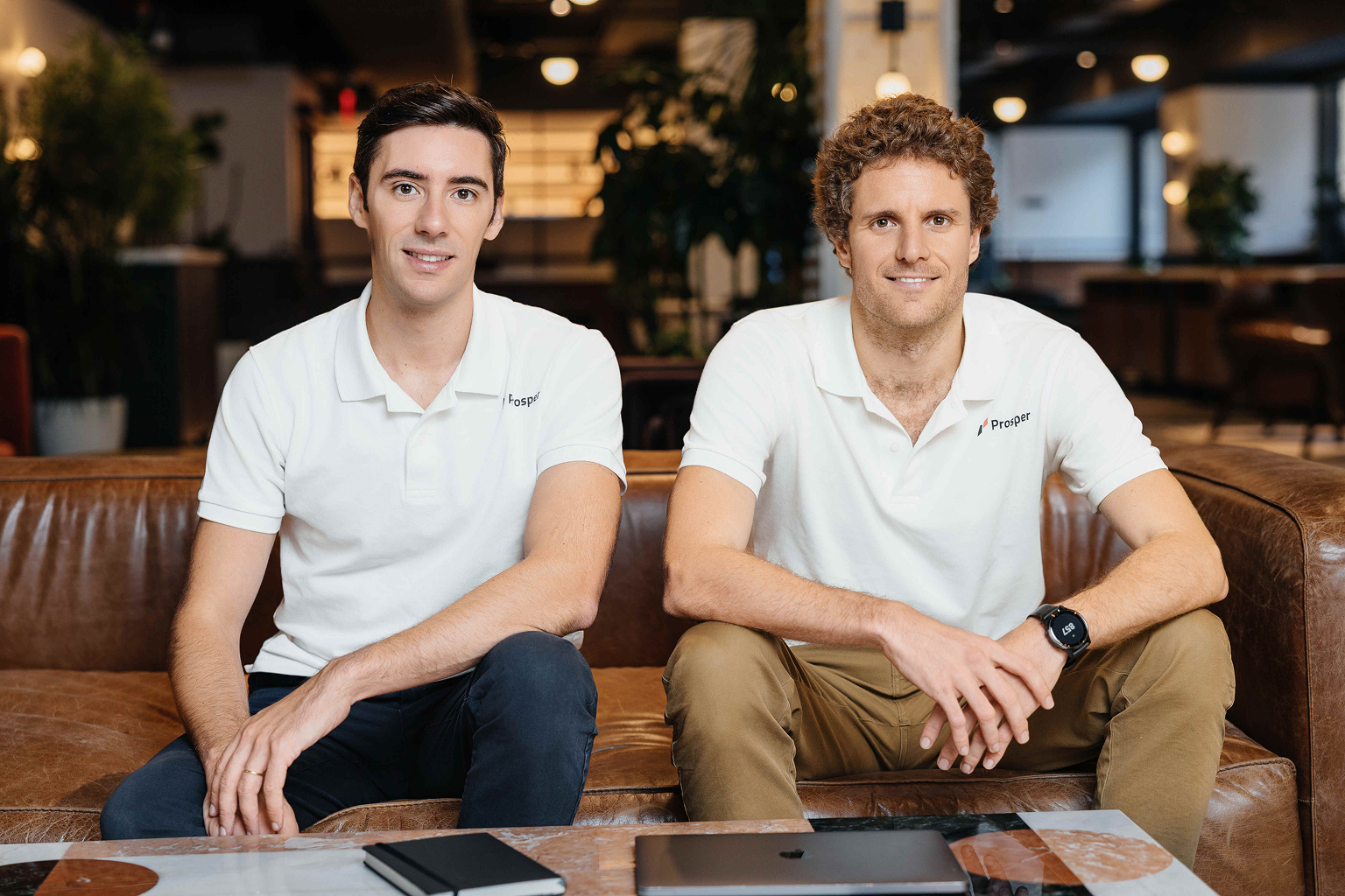 Prosper AI co-founders Xavier de Gracia, left, and Josep Mingot, right, seated together
