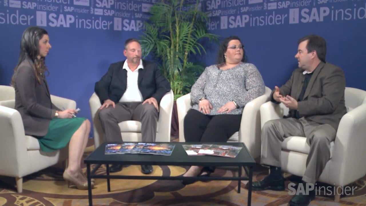 Joseph Cabrera, at right, speaks with Natalie Miller and Movado executives Mitch Spaner and Maria Carbone during a SAPinsider interview