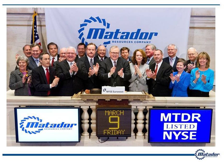 Joseph Foran at the center of Matador’s group at the NYSE closing bell on March 9, 2012