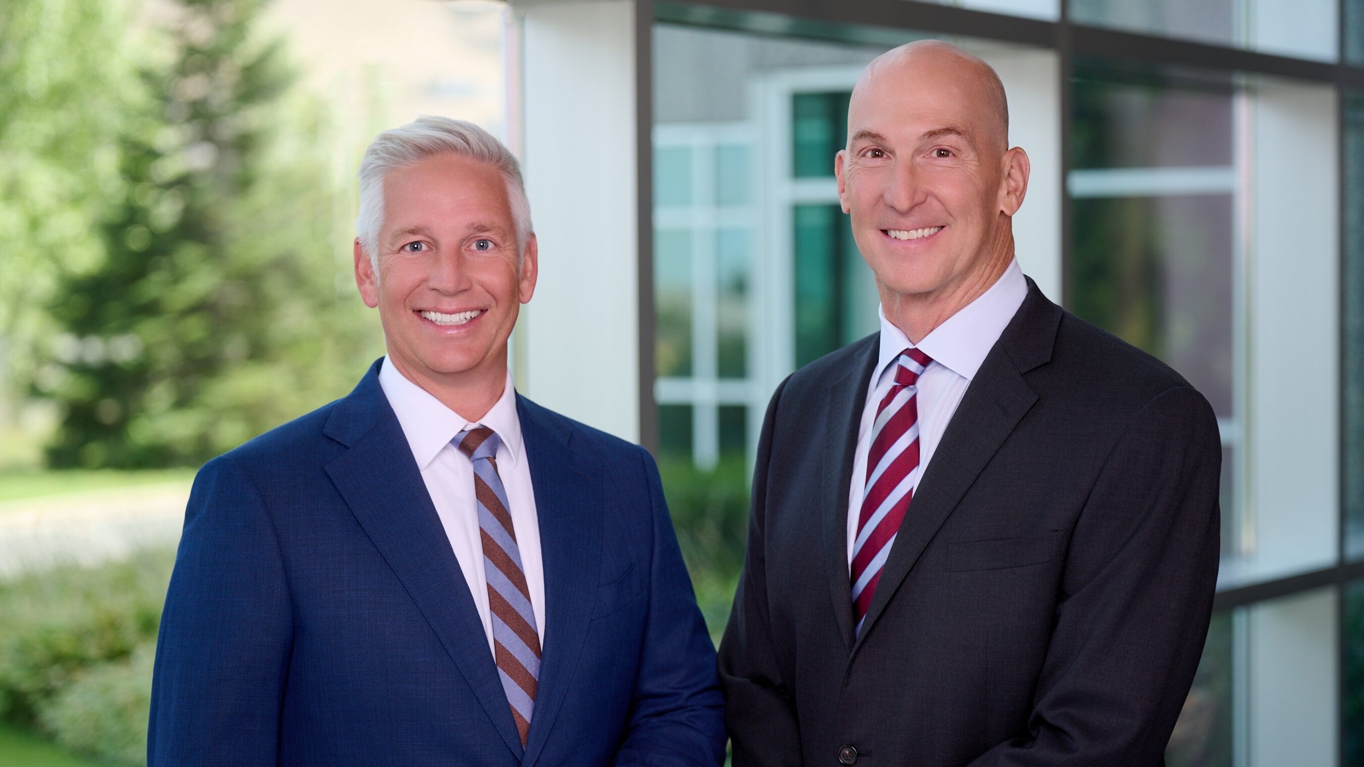 Noah Springer, left, and Joseph Margolis standing together at Extra Space Storage headquarters