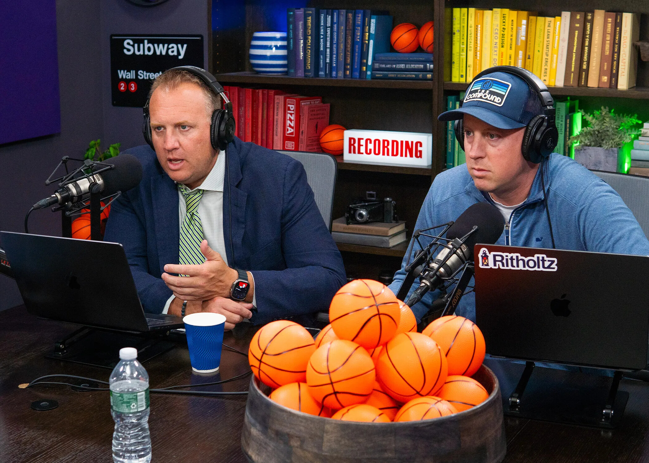 Josh Brown and Michael Batnick recording The Compound and Friends in a studio