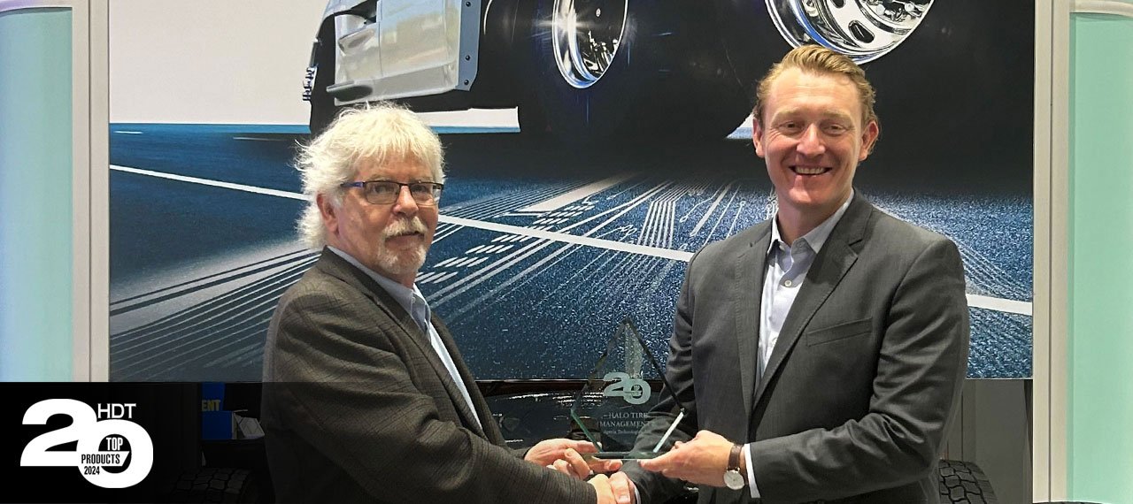 Josh Carter, right, receiving an HDT Top 20 Products award from Jim Park