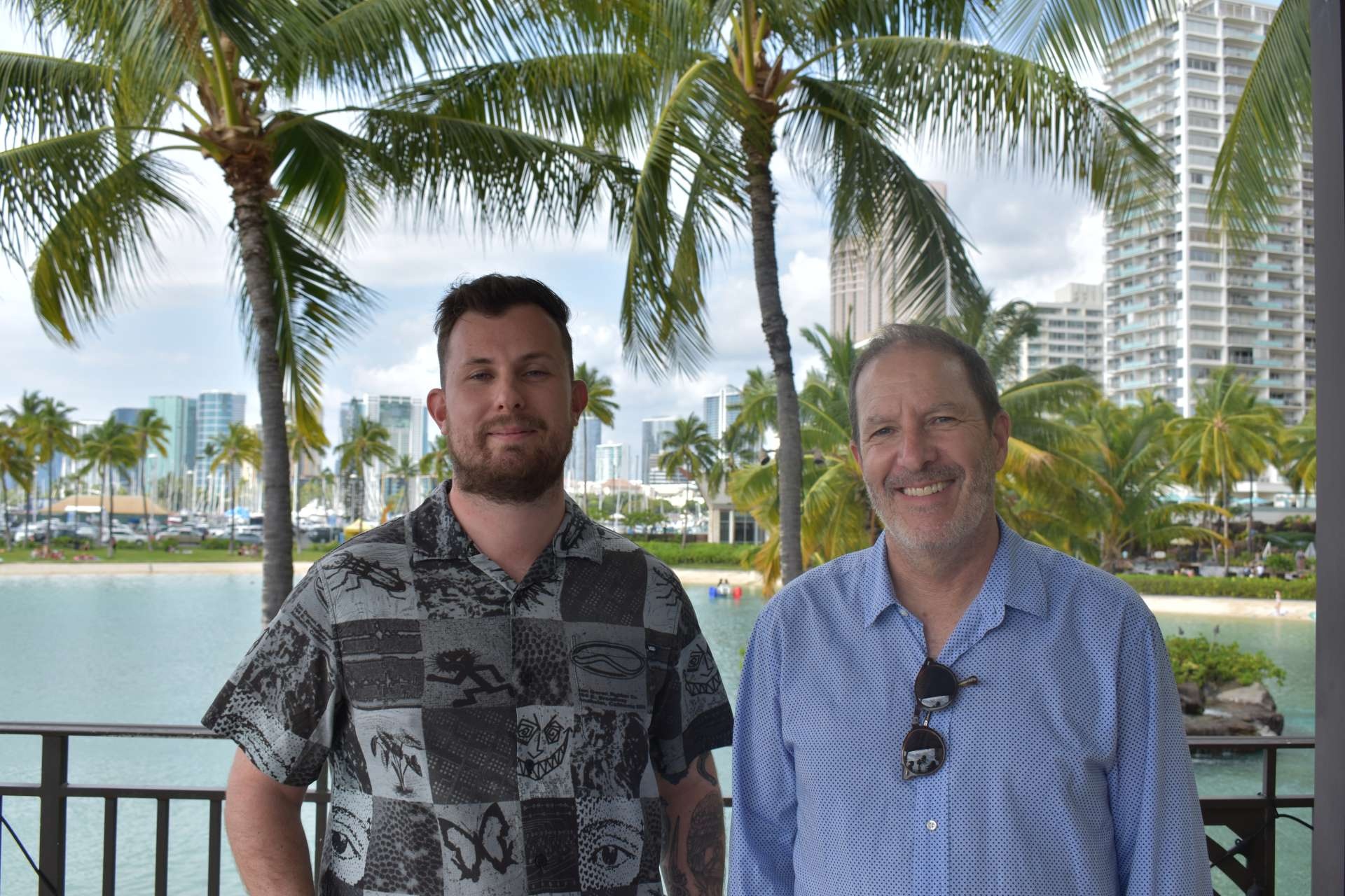 Josh Claman, right, and interviewer Jack Haddon outdoors at PTC 2026 in Hawaii