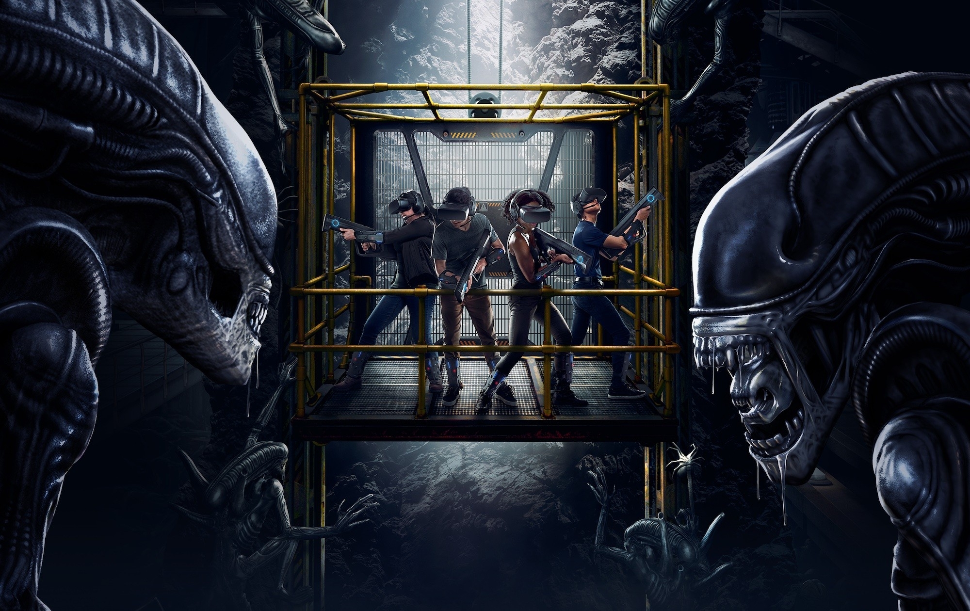Promotional image of three VR participants surrounded by an alien environment