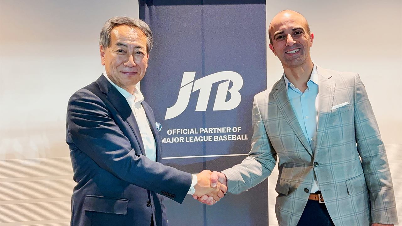 JTB president Eijiro Yamakita and Dodgers global partnerships executive Lorenzo Sciarrino at the partnership announcement