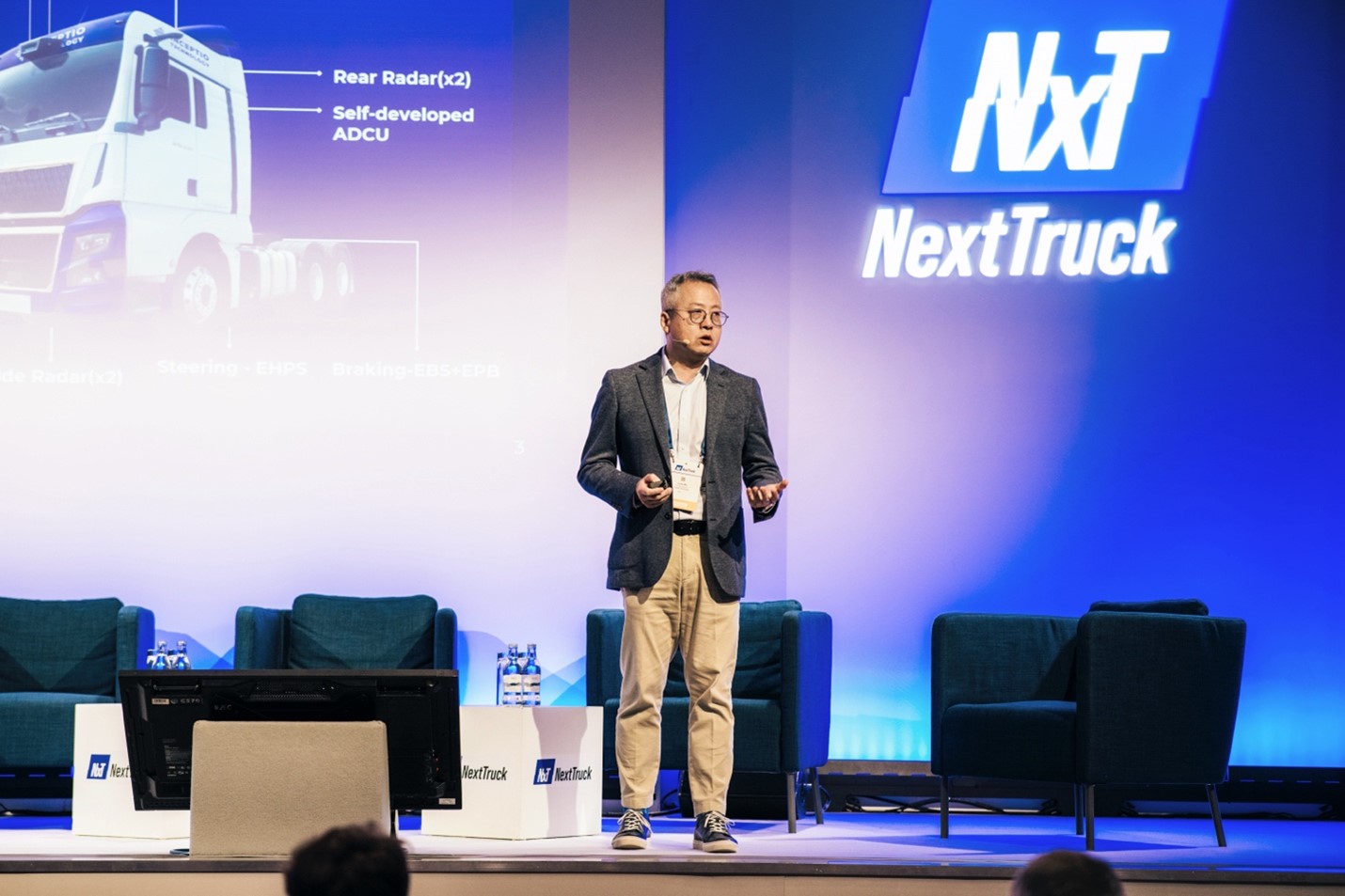 Julian Ma presenting autonomous trucking technology at Next Truck 2025 in Berlin