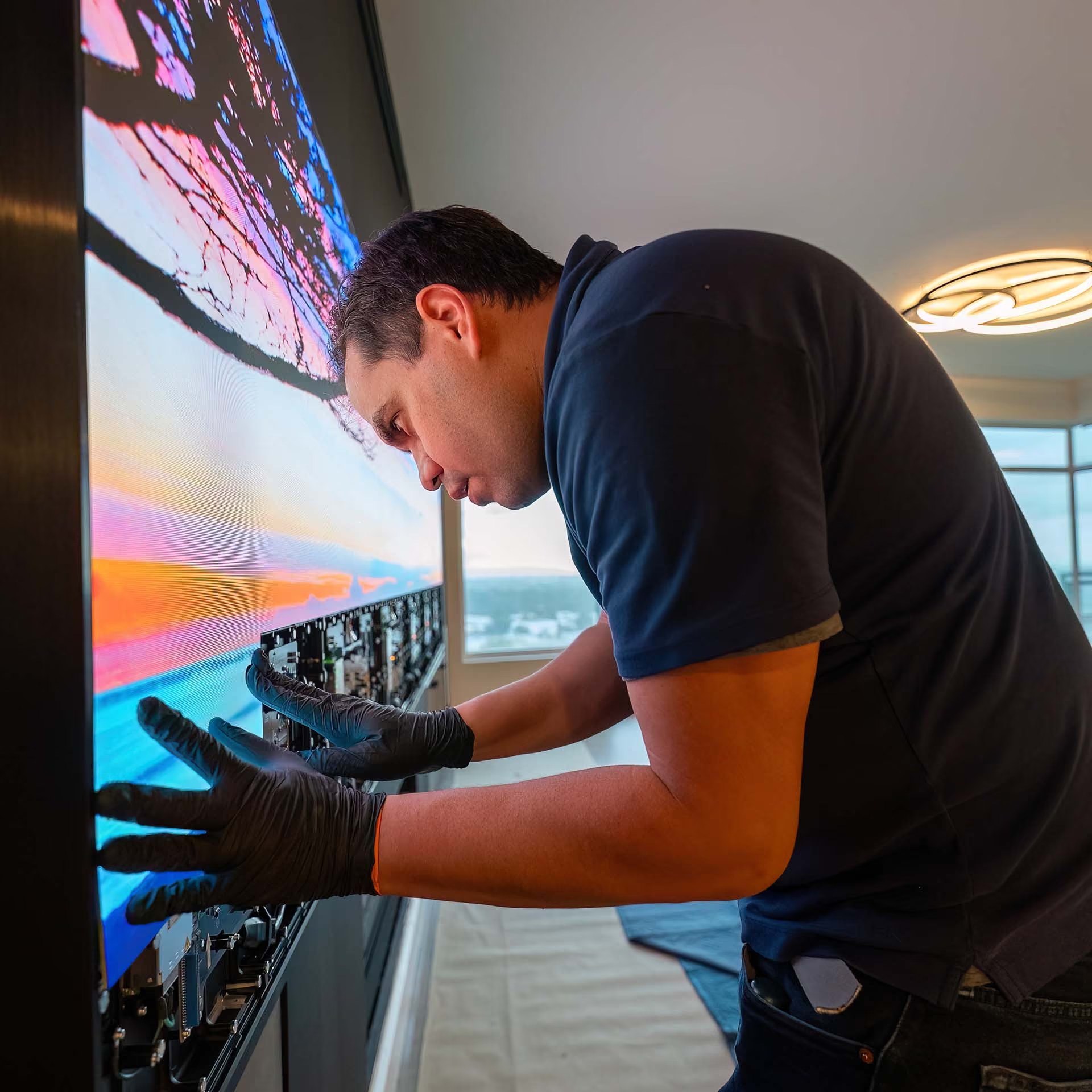 A close inspection of microLED panels during manufacturing quality control