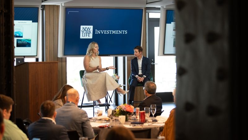 Amanda Chomyszak interviews Justin Kelly at a New York Life Investments client education event.