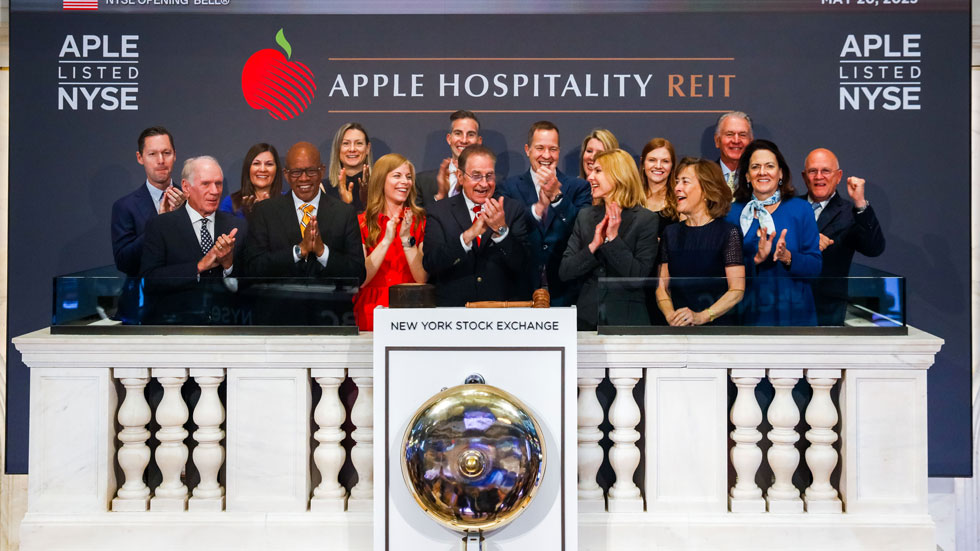 Justin Knight and the Apple Hospitality team celebrating at the New York Stock Exchange opening bell