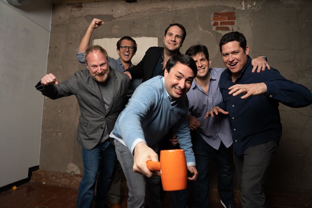 Six members of ParkHub’s leadership team posing together in an archival 2019 photograph