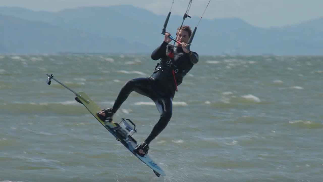 Kai Stephan kiteboarding on San Francisco Bay with a test rig attached to the board