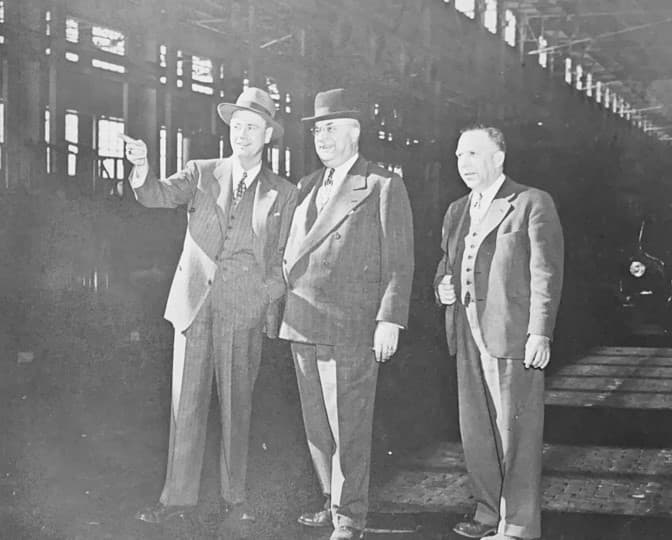 Historical company photograph of Henry Kaiser touring the Trentwood operation in 1946